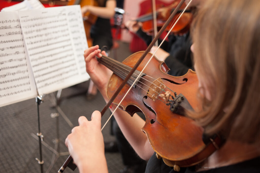 Girl playing violin.